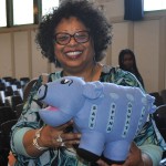 Linda Sue Collins, Teacher-Librarian at Ray Elementary, Chicago Public Schools with the Money Savvy Pig hand puppet